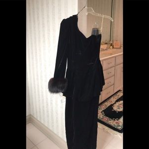 Long black velvet one shoulder dress.